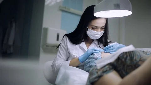 Ultrasonic face cleaning, young male. Hands of cosmetologist working. Stock Footage