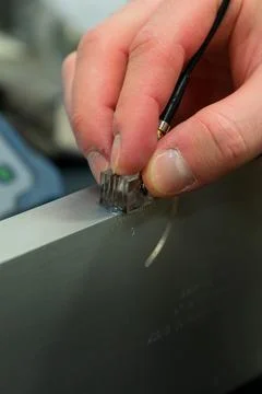 Ultrasonic Testing Calibration Process on Reference Block in NDT Lab Foto stock