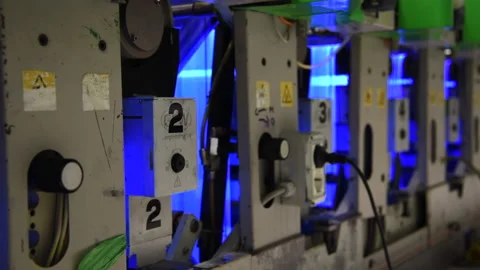 Ultraviolet lights dry the print. Stock Footage 130755827