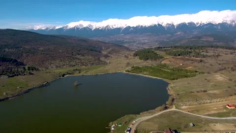 Uludag snow covered distant high angle aerial view with Gokoz lake Stock Footage 140462270