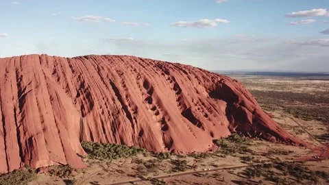 Uluru / Ayers Rock in Central Australia - Aerial Panoramic Drone Shot at sun set Video stock 138330638