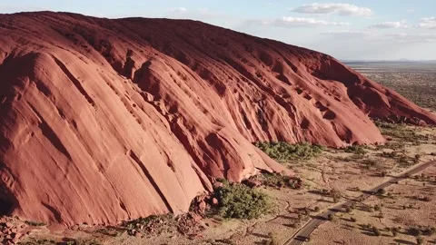 Uluru / Ayers Rock in Central Australia - Aerial Panoramic Drone Shot at sun set Video stock 138330960