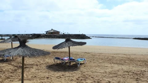 Umbrella and bar on the beach Stock Footage 234709421