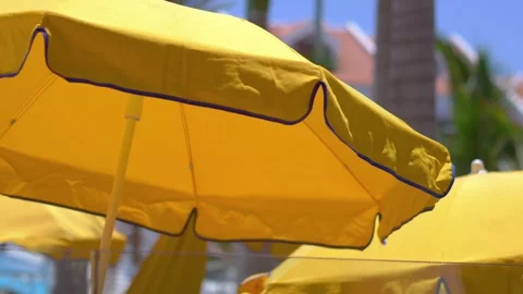 Umbrella on the beach in 4k slow motion 60fps Stock Footage 244488522