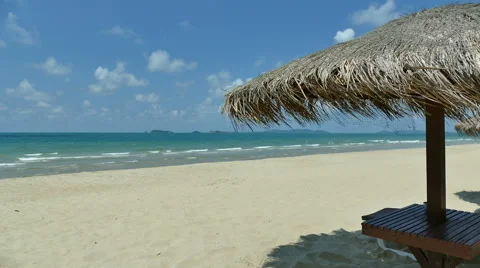 Umbrella on the beach Stock Footage 64920645