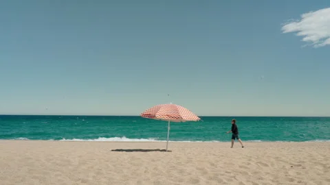 Umbrella at the beach 스톡 동영상 240537373