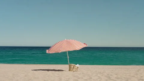 Umbrella at the beach Stock Footage 241084236