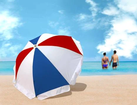 Umbrella on the beach Stock Photos
