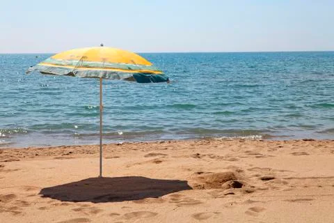 Umbrella on the beach Stock Photos