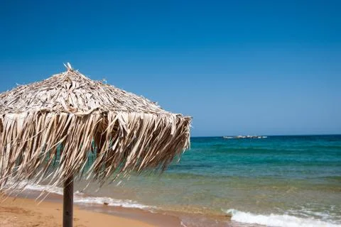 Umbrella on the beach. Stock Photos