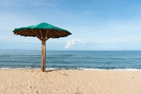 An umbrella on the beach Stock Photos