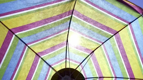 Umbrella on the beach in slow motion Stock Footage 157863755
