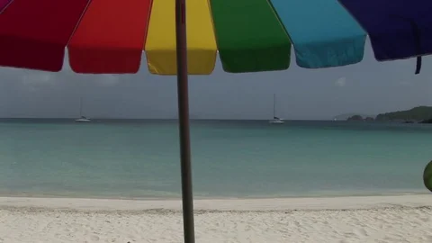 An umbrella on the beach.  St. John, USVI 스톡 동영상 72571441