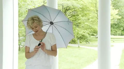 Umbrella Blonde Stock Footage 22796052