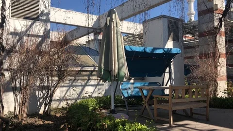 Umbrella with chair. Stock Footage 85979005