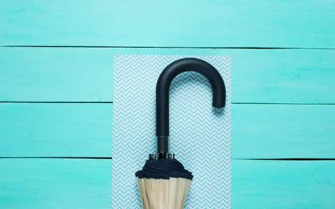 Umbrella hook on blue background 写真素材
