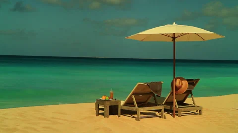 Umbrella looking out at blue ocean Stock Footage 34807005