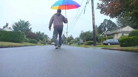 Umbrella Man 4 Jumping Stock Footage 1019397