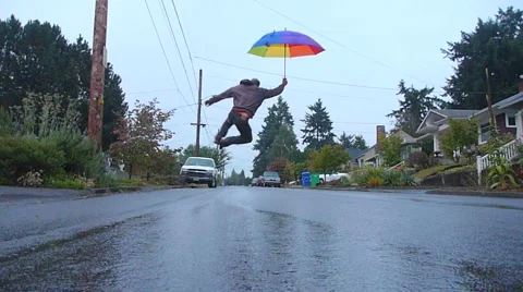 Umbrella Man 5 Having Fun Stock Footage 1019410