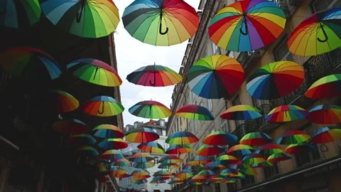 Umbrella with rainbow pride flag in horizontal position Stock Footage 234069120