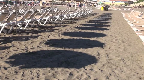 Umbrella shadows on sand Stock Footage 68288350