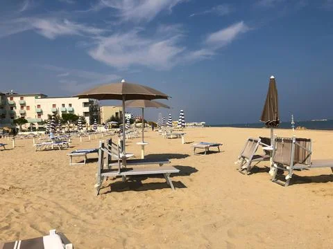 Umbrellas and Beach of Cesenatico on the Romagna Riviera in Italy Stock Photos
