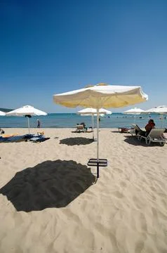 Umbrellas and beach Stock Photos