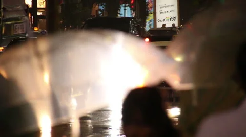 Umbrellas and traffic lights Video stock 40635670