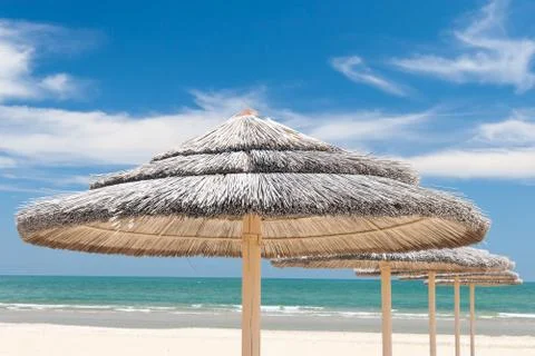 Umbrellas on the beach Stock Photos