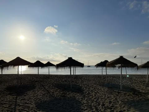 Umbrellas on the beach Stock Photos