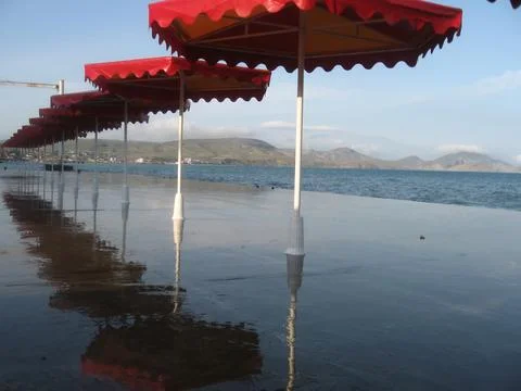 Umbrellas on the beach Stock Photos
