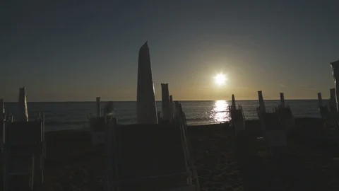 Umbrellas beach with sunset landscape Stock Footage 88170946