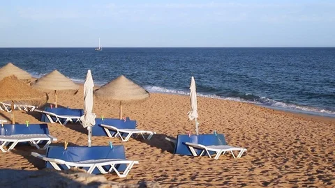 Umbrellas on beautiful summer beach Video stock 116726008