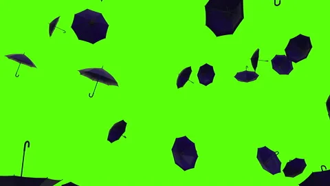 Umbrellas exploding over green screen. Sunshades explosion across the screen. Video stock 239125026