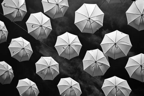 Umbrellas rain down Stock Photos