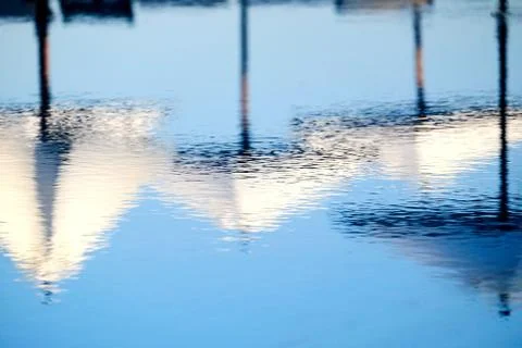 Umbrellas reflection Stock Photos