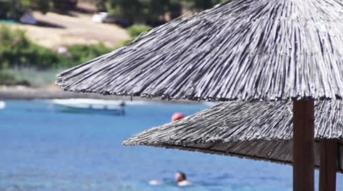 Umbrellas on sea Stock Footage 25210924