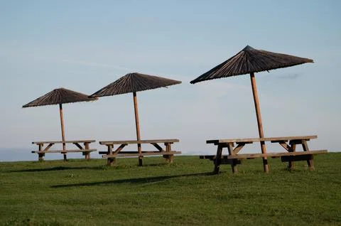 Umbrellas at the sea side Stock Photos