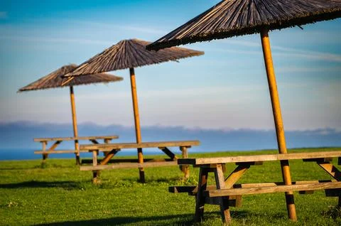 Umbrellas at the seaside Stock Photos