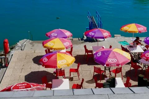 Umbrellas set up for summer fun Stock Photos