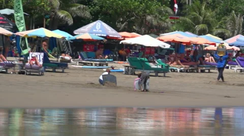 Umbrellas on Tropical Beach Stock Footage 49404458