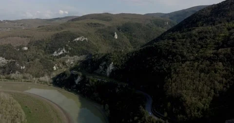 Umbrian landscape with highway in the middle of the deep forest Stock Footage 237877243