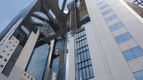 The Umeda Sky Building . View of the building from the street. Video stock 124978087