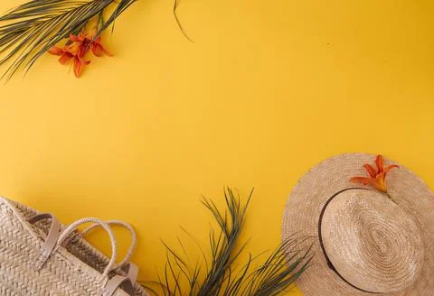 Ummer background with straw hat and bag and palm leaves Stock Photos