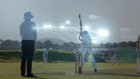 Umpire anchoring while bowler starting run, HUD nodes tracking ball paths for Video stock 333910970