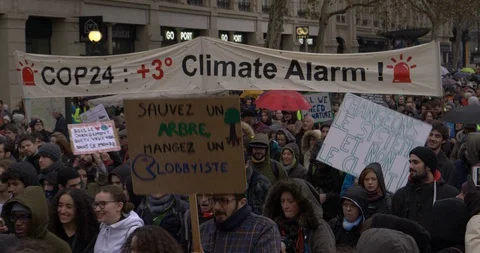 UN COP Protest climate change alarm plus 3 degrees banner Video stock 99560545