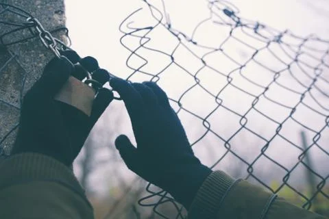 Unauthorized Entry Thru Fence Stock Photos