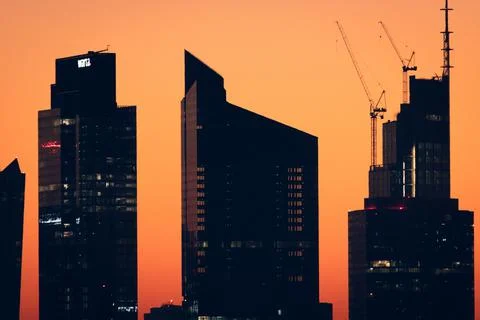 Unbelievable red sunset over the Poland skyscrapers. Warsaw at early morning. Stock-Fotos