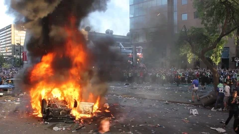 Unbelievable scene of destruction and disarray in a city during major riots Stock Footage 127196857