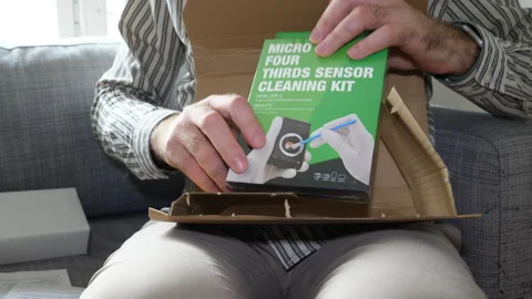 Unboxing Amazon Prime Parcel: Micro Four Thirds Sensor Cleaning Kit Stock Footage 265812575